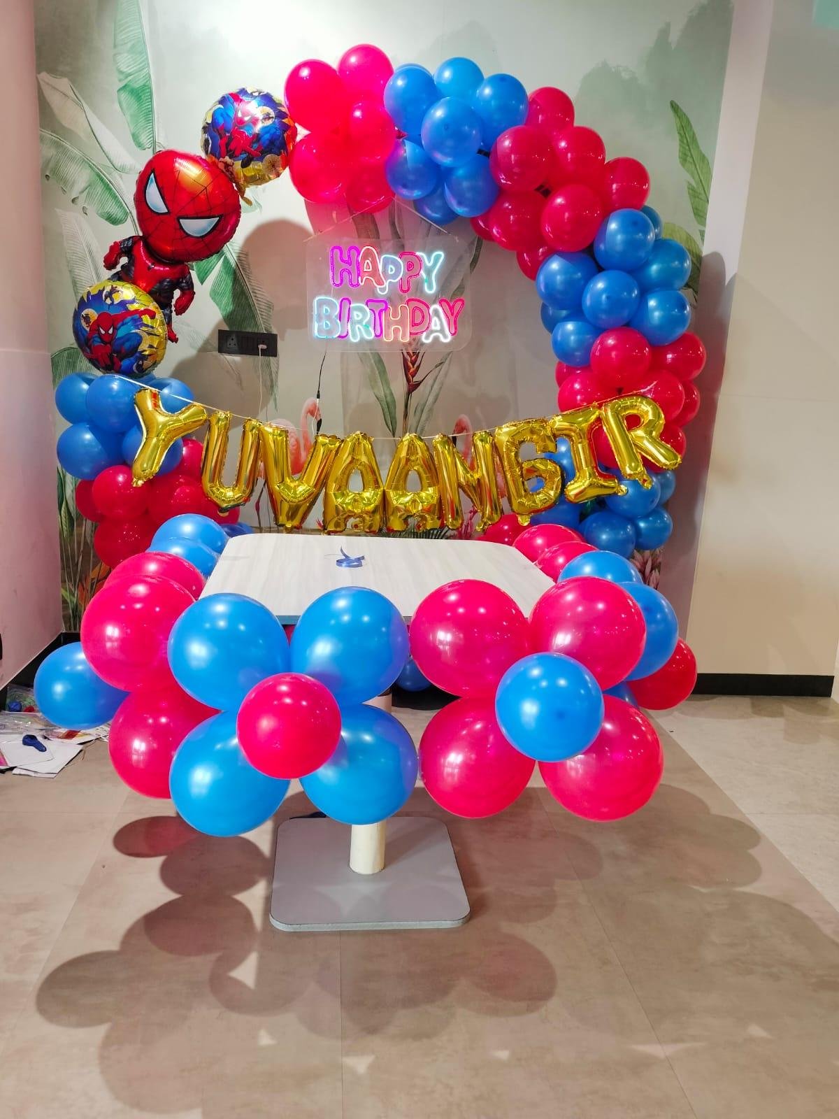Gender reveal pink and blue balloon decoration