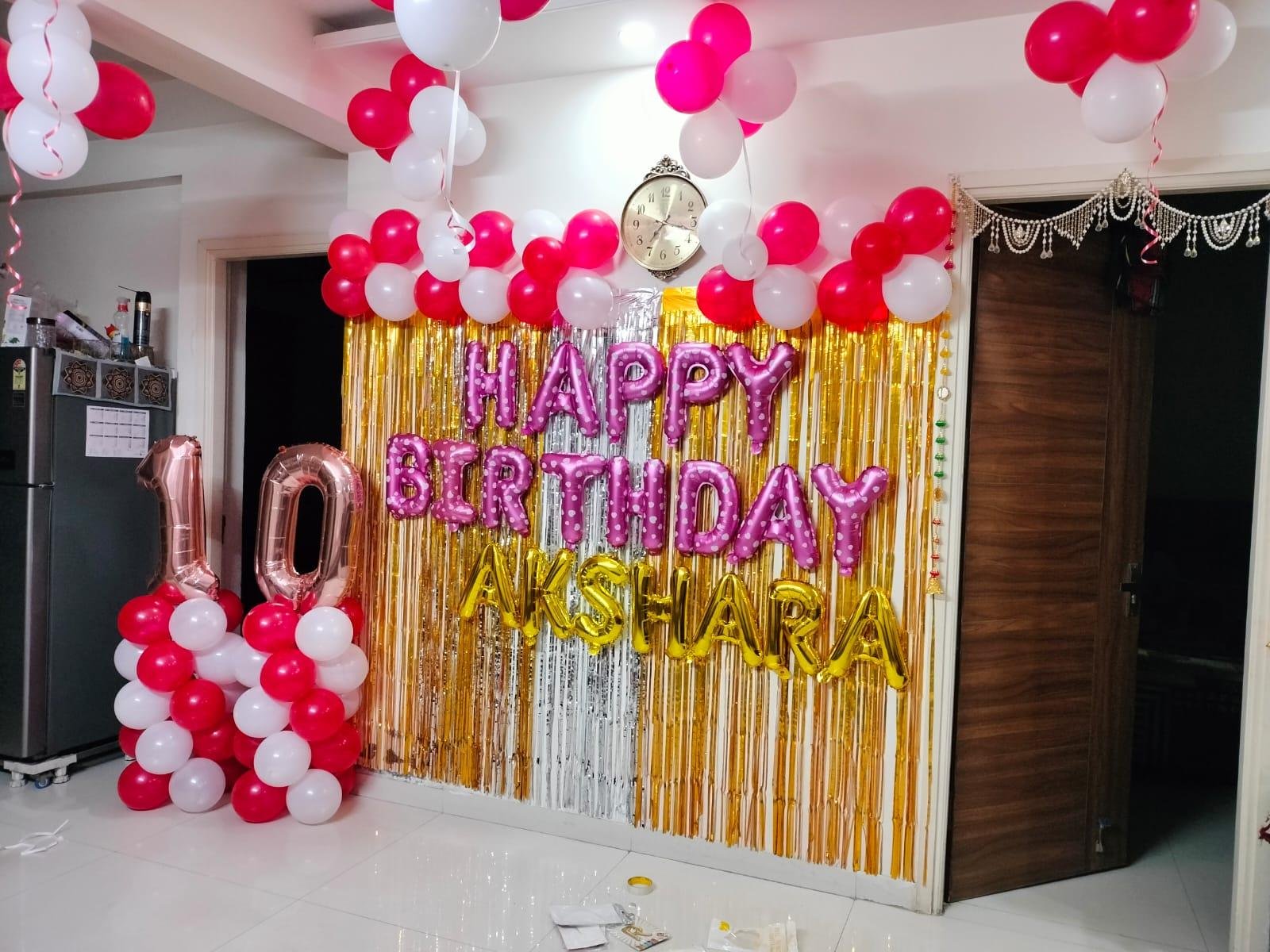 Romantic anniversary decoration with roses and balloons